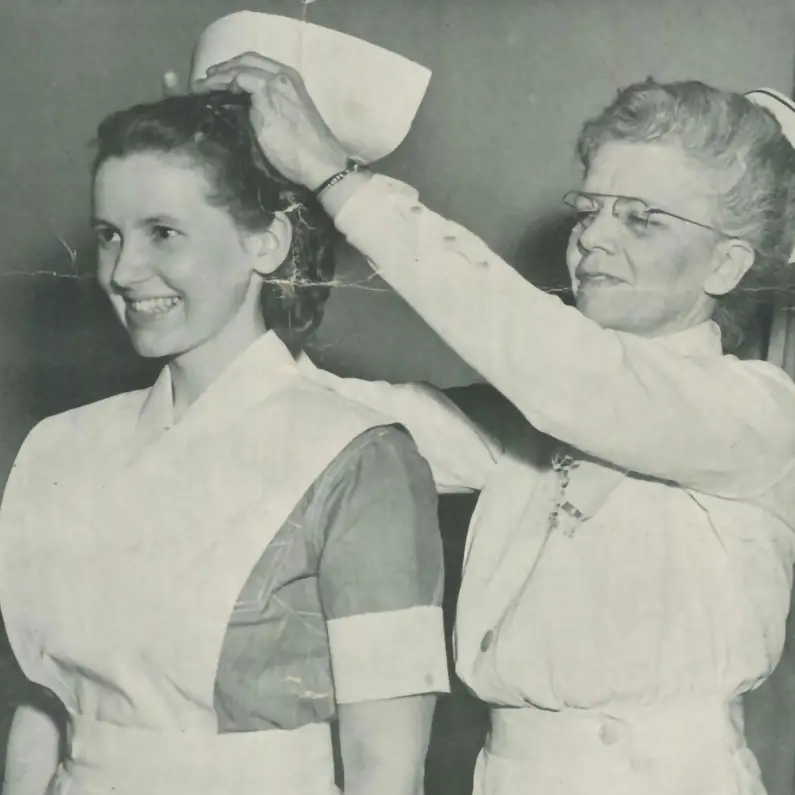 PCOM nursing program graduate during capping ceremony, circa 1948