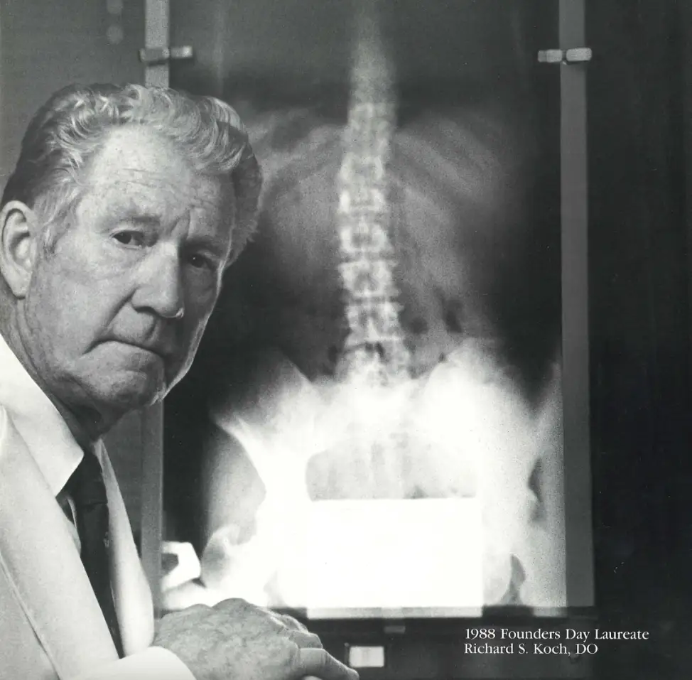 Richard S. Koch, DO ‘38, poses in front of an x-ray slide