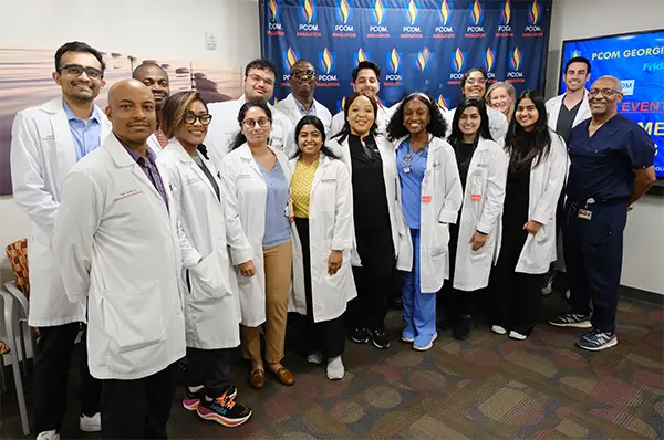 Inaugural PGY1 Internal medicine residents class from SRMC and PCOM Faculty Members Drs. Frank Jones, Audrey Arona, and Erik Zarandy.