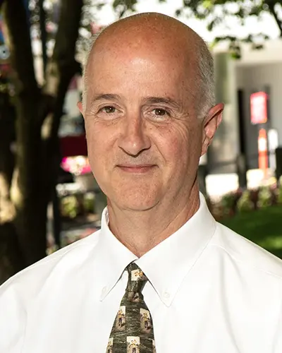 Professional headshot photo of Andy Mueller