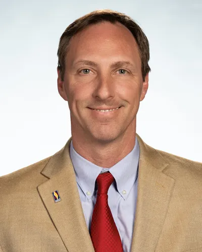 Professional headshot photo of Samuel Matheny, PCOM's Chief Student Services Officer
