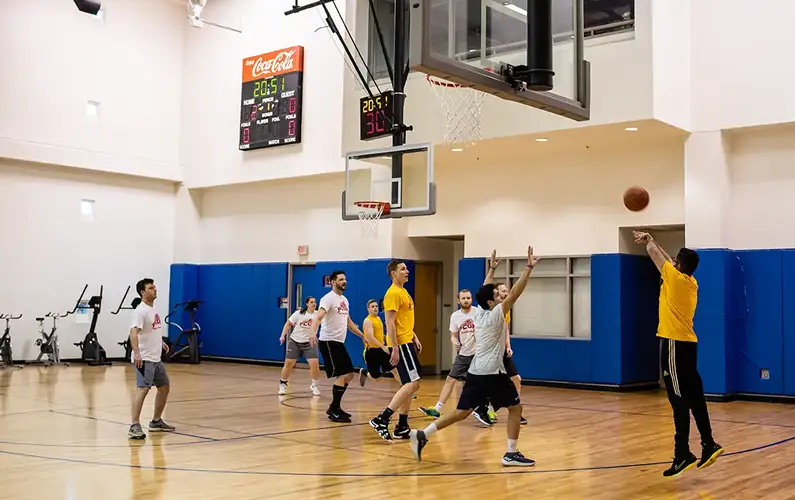 Students playing basketball at the PCOM Activities Center