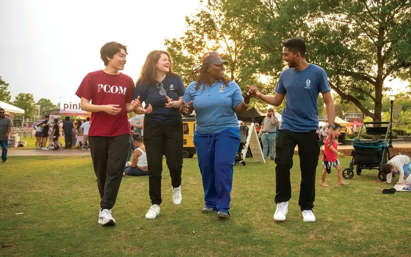 PCOM Georgia students participate in a local fair held at Suwanee’s Town Center Park, providing educational programming and health screenings and connecting the College with the community.