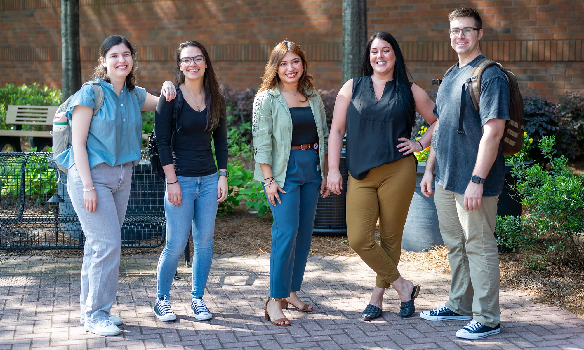 PCOM Georgia students smiling together during a community event hosted on campus