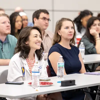 Research Day audience watch presentation