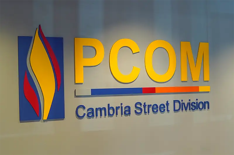 PCOM Cambria Street Division sign on the wall of the newly renovated healthcare center