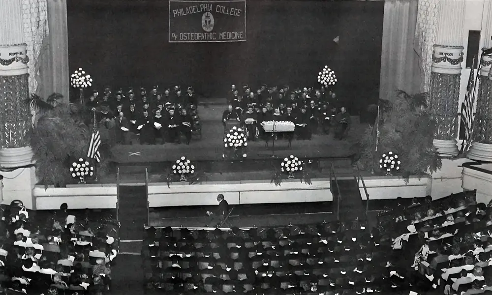 Overhead shot of PCOM Class of 1973 in Philadelphia's Academy of Music theater