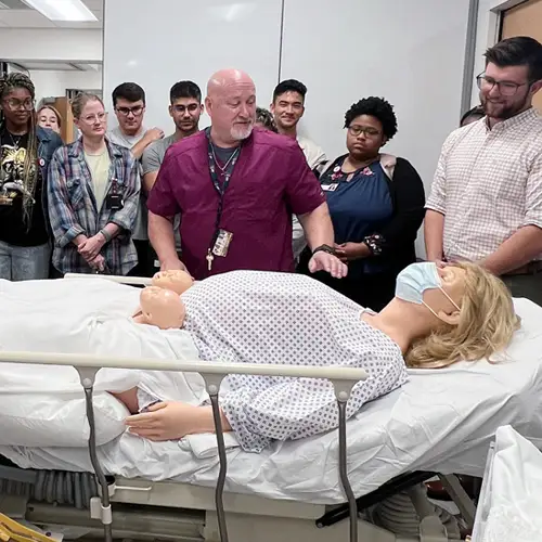 FIRE program participants observe patient care manikins