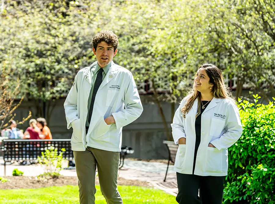 PCOM students standing in a courtyard on the Philadelphia campus.