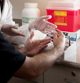 Healthcare professional assists a patient to conduct an allergy test.