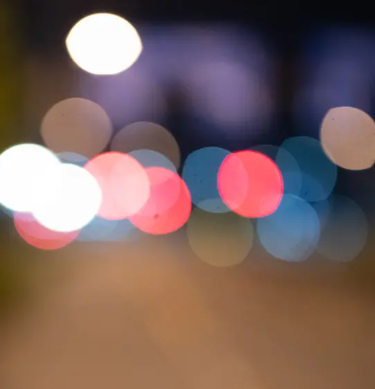 Emergency vehicle lights shown at a distance