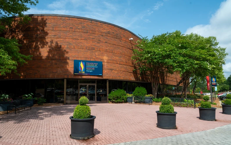 Front doors of the main building of PCOM Georgia