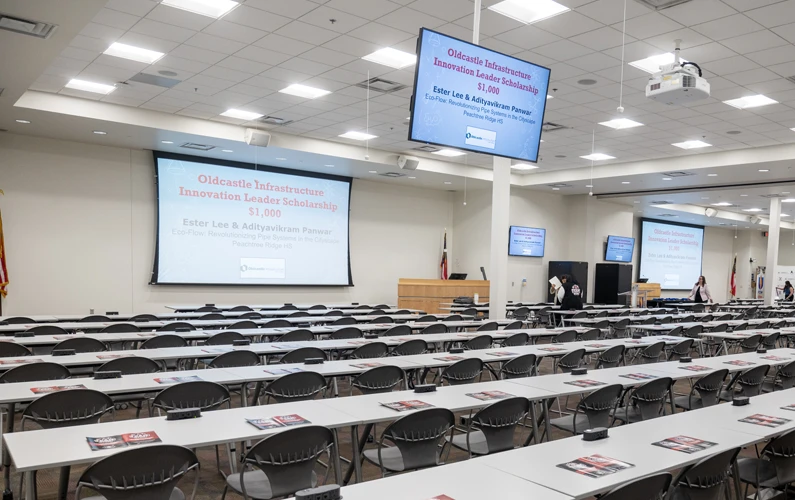 Photo of a large classroom, tables, chairs and audio/video equipment at PCOM Georgia